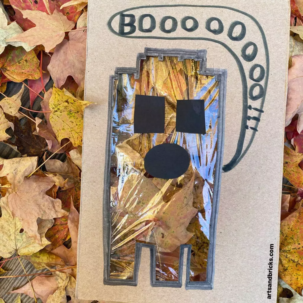 Explore your surroundings -- like fallen autumn leaves -- with this Ghost Peek-A-Boo Cardboard Craft! Use cardboard (we used a cereal box panel) to create a ghost. Ours is a LEGO brick ghost!!! Add plastic wrap over the body and tape on a spooky face. Don't forget to add a BOO! Next is the fun part, start framing textures and colors - both indoors and outdoors. Don't forget to take pictures! Have fun!#lego #craft #google #cardboard #forkids #easy #recycled #naturecrafts