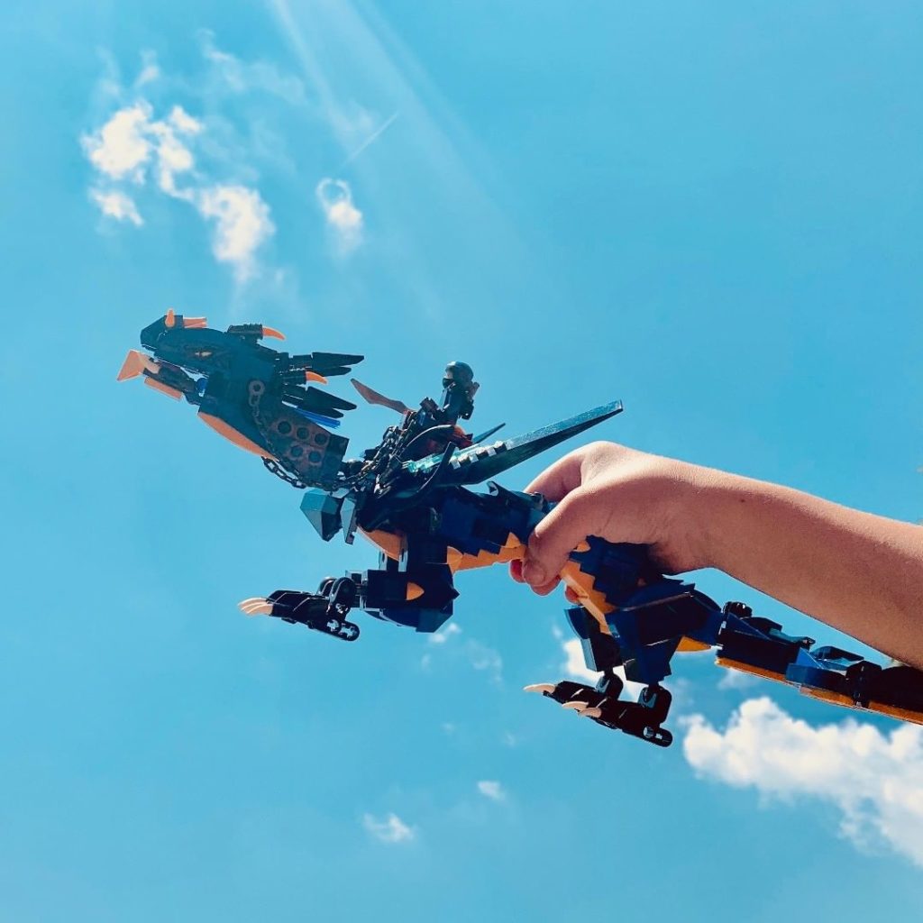 Lego Ninjago stormbringer dragon - flying with blue sky and clouds