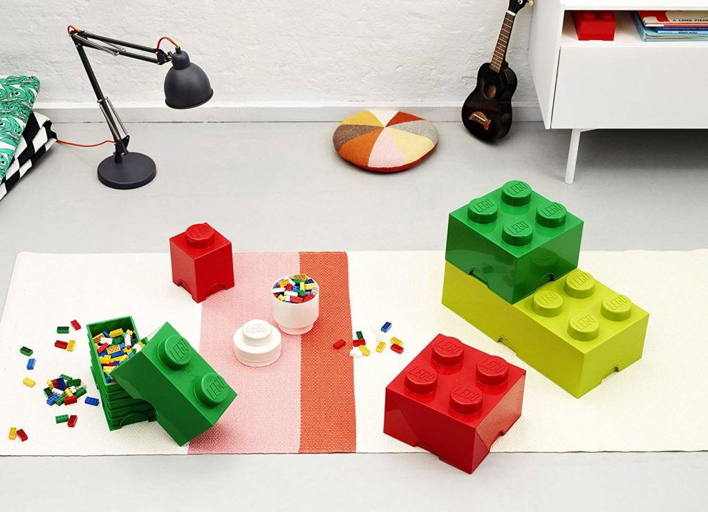 Lego Storage Blocks: These cute LEGO Brick storage boxes are a clever way to store your LEGO brick collection, or even just an easy way to travel with LEGOs, especially useful for holiday visits and family vacations. Multiple-sized plastic storage brick bins are a fun way to decorate and to keep bricks off of your floor, too!