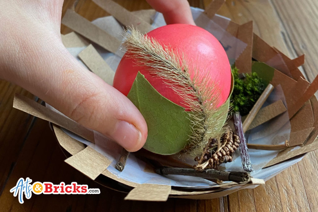 Check out this blog post about  how to make a paper bag nest for easter egg display. 