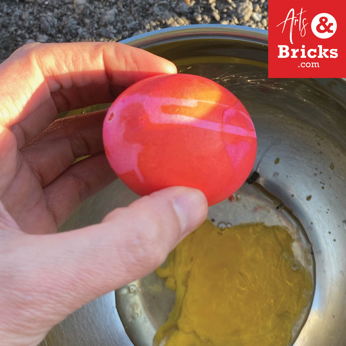 Example of egg white and yolk dripping on pre-dyed blown out easter egg