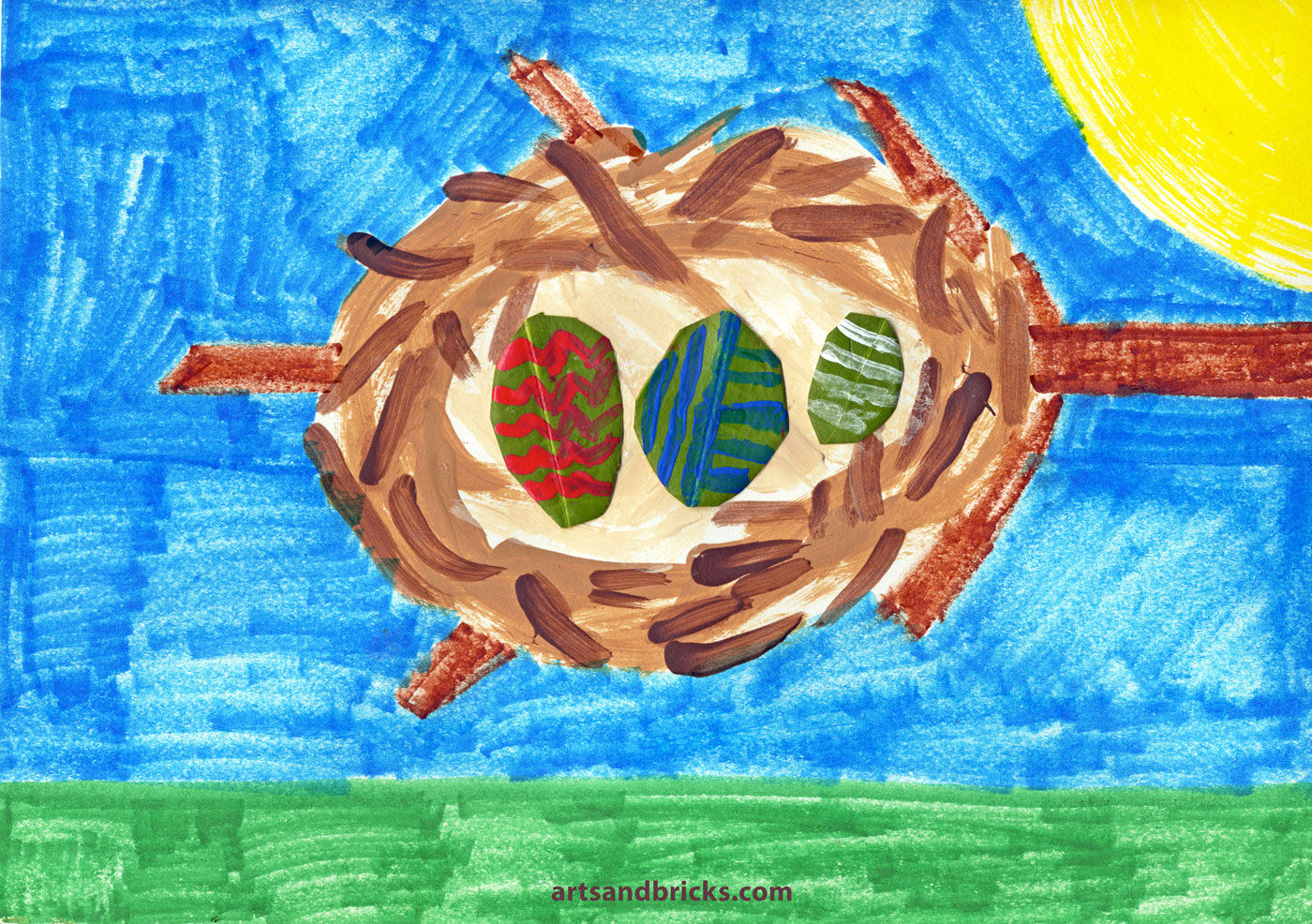 Use found leaves to create this painted Kid's Nature Art project. The painted nest rests in a tree branch, with colorful decorated Eggs (maybe Easter eggs!) made from cut and painted leaves. A beautiful elementary-age nature art project!