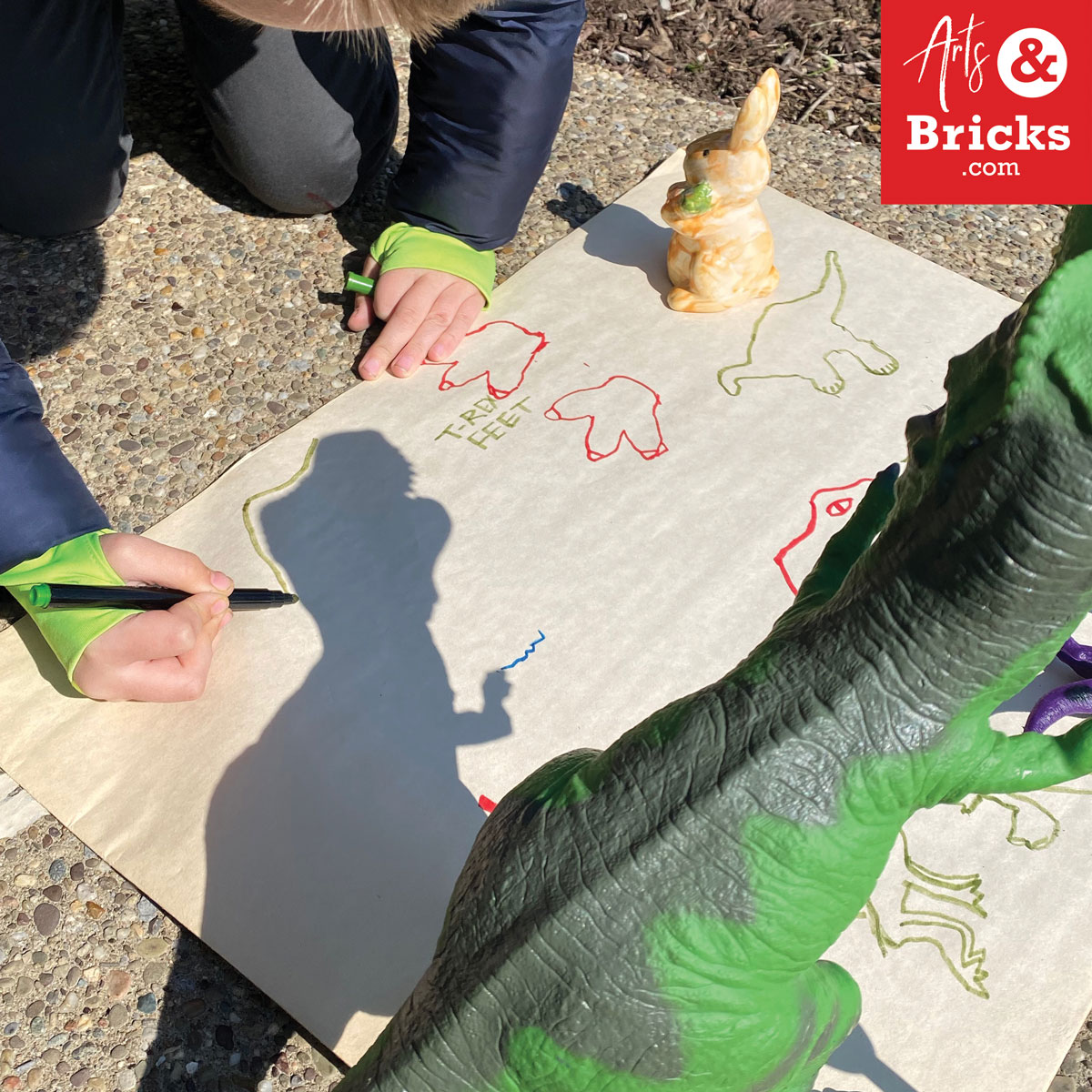 Explore the shadows that your toys make in the afternoon sun; simple art project outdoors.