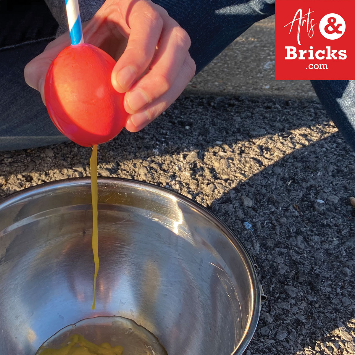 Traditionally, we've always hard-boiled eggs for decorating and dying. This year, we wanted to display Nature-Decorated Easter Eggs, so we decided to give blown out eggs a shot. It worked pretty well, here's what we did. This image shows how to use a straw to blow out your egg.  