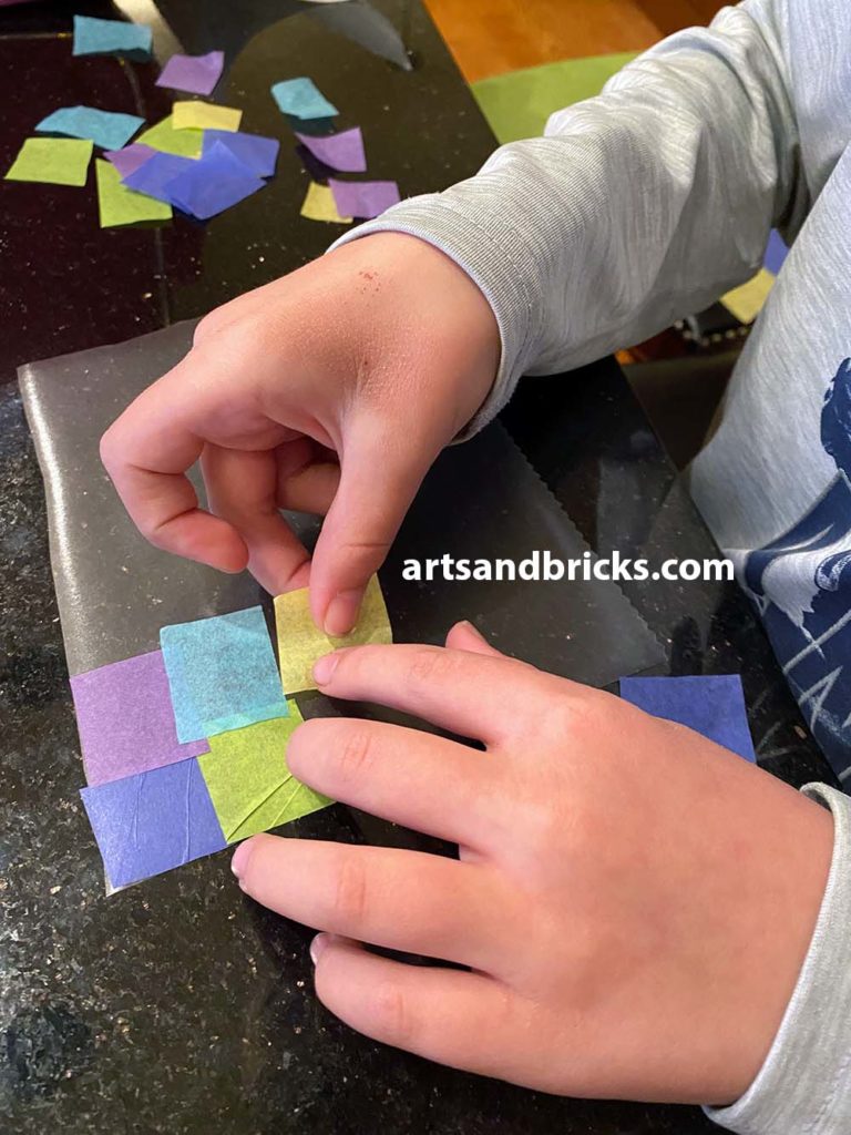 Tissue paper mosaics with contact paper.
