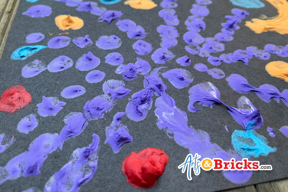 Blog post about how to make puffy paint for kids using shaving cream, glue and paint