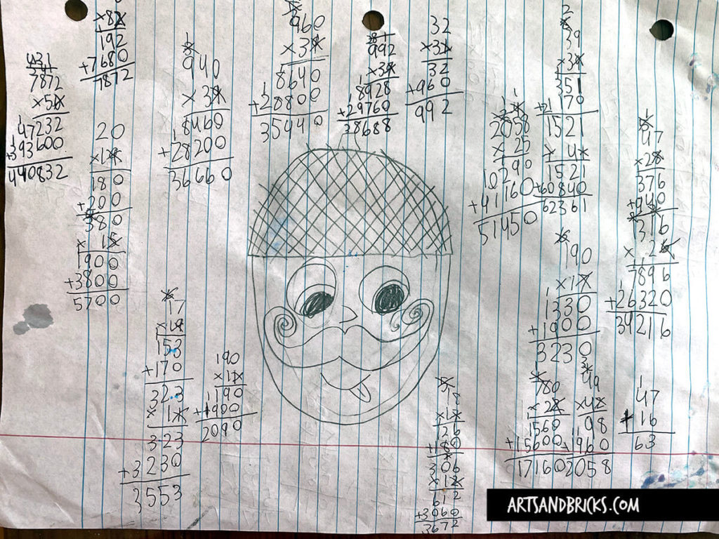 Example of the pieces of paper I find laying around the house; they're covered with equations solved to win battles in the children's math game Prodigy.