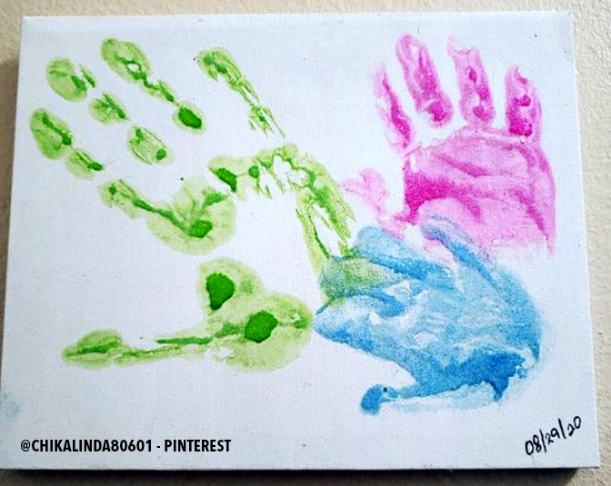 Find inspiration for your family painted handprints on canvas.