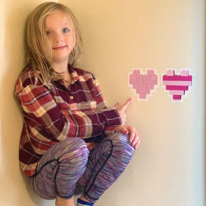 Heart shapes built with LEGO bricks and printed as wall decals