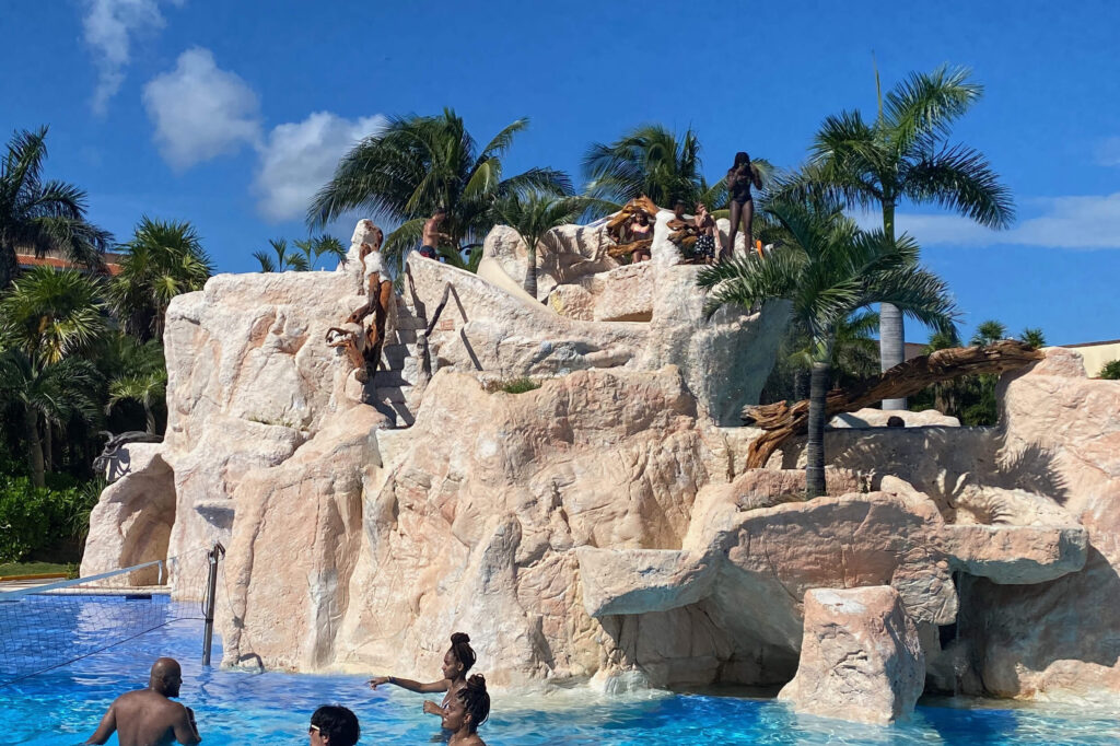 The best pool at El Cid, the Marina pool with water slide and jumping rock; water volleyball and more.