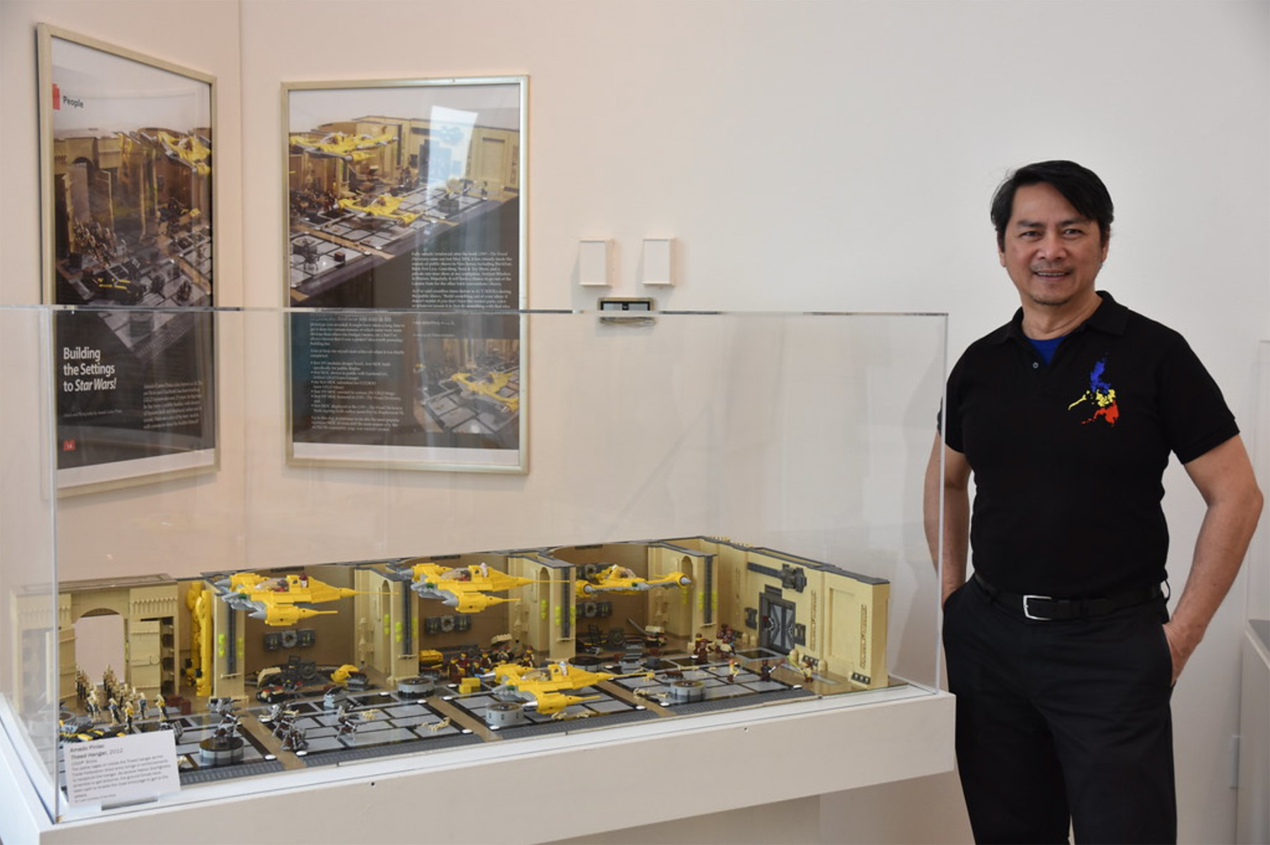 Amado Pinlac, known on social media as ACPin, is a Master LEGO artist who often tours with Brick Convention is shown with his favorite MOC, Theed Hangar.