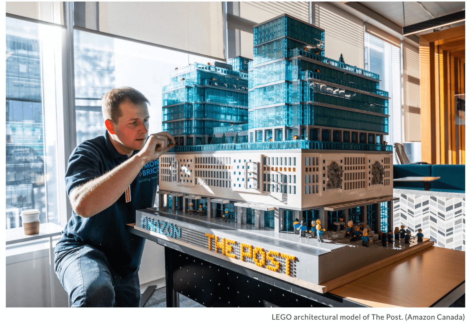 LEGO artist, Graeme Dymond, working on architectural model of The Post.