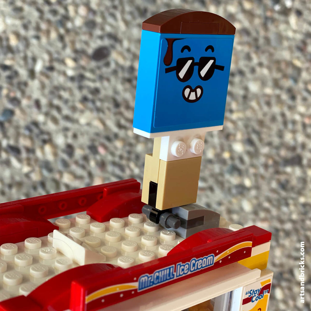 A fun summer set, the LEGO City Ice Cream Truck serves up popsicles and ice cream to hungry Minifigures and pets!