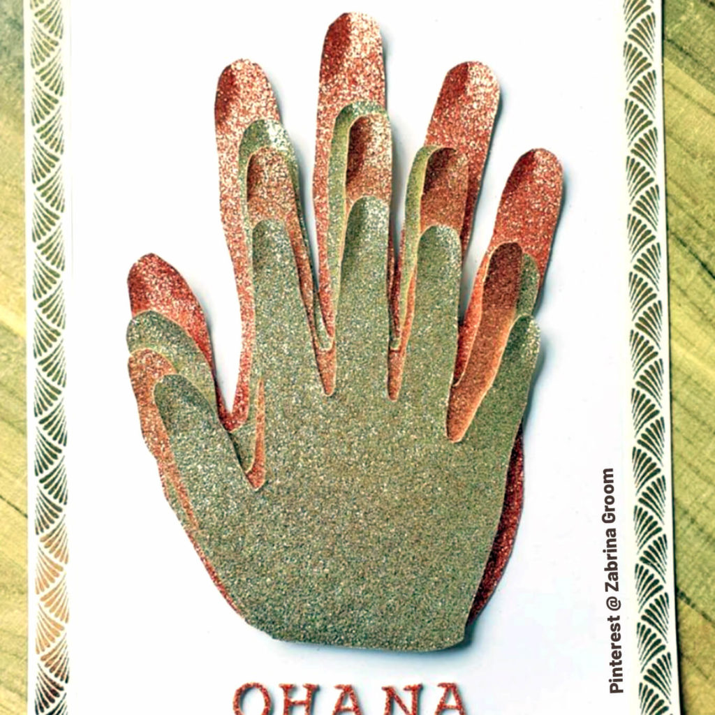 Glittery paper family handprint craft. Ohana. Pinterest by Zabrina Groom.