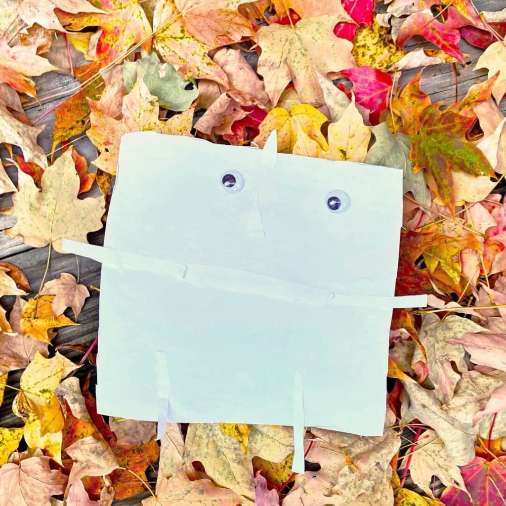 Paper Hugging Monster with wiggle eyes.