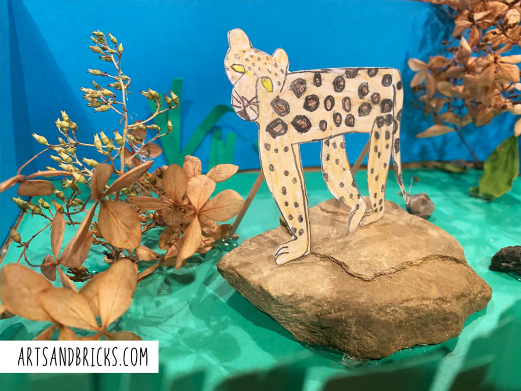 There's no need to purchase animals for your child's science diorama. Instead, you can draw animals and prop them up with toothpicks. For more diorama inspiration read our full post.