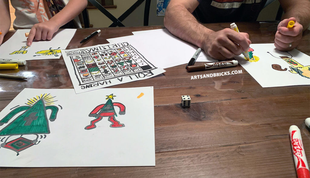 A family playing a Christmas-themed Roll-a-Haring art game.