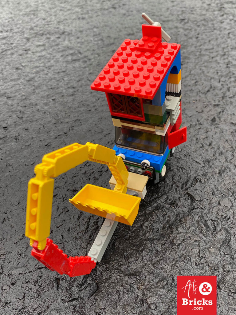 Introducing the Dig-O-Matic. This feat of eight-year-old engineering is most notable for its rollable hinged digger bucket! Its playful functionality is created by connecting eight hinged Lego bricks to the bucket. See more images and our favorite additions on our blog.
