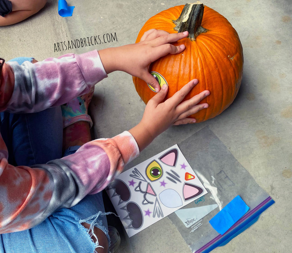 Pumpkin decorating has changed quite a bit since I was a kid in the 80s and 90s; now, there are ideas and kits galore, printable patterns for carving, and so much more. It can be a bit overwhelming. An easy, go-to favorite is decorating pumpkins with vinyl sticker packs.